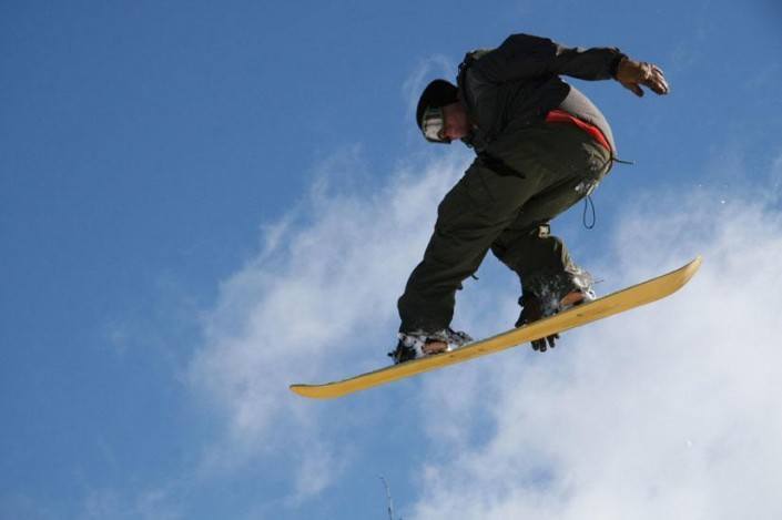 Snowboarder catching air